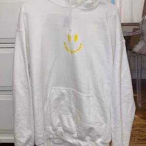 White hoodie with decal designs